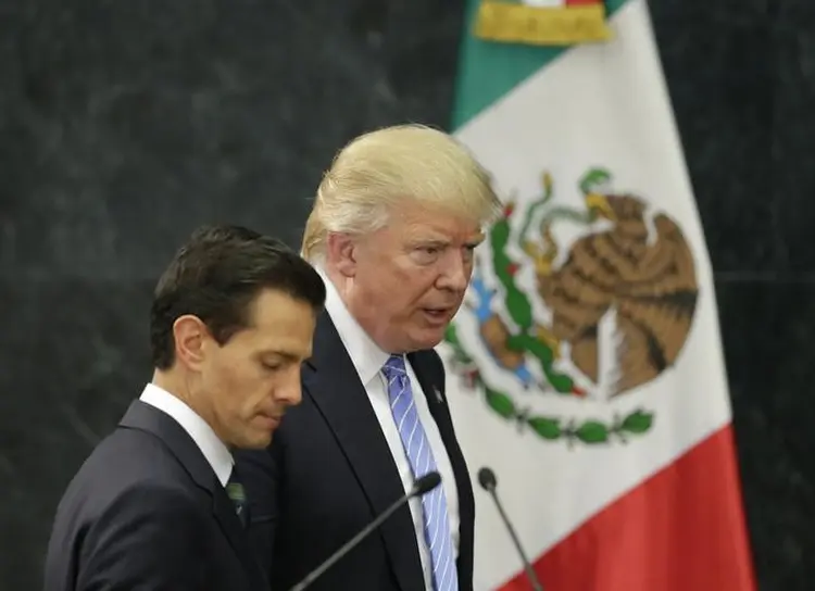 Peña Nieto e Trump: Grande parte da ajuda dos EUA ao México vem meio do programa do Plano Mérida, sob o qual o Congresso destinou 2,6 bilhões de dólares para a assistência de segurança entre 2008 e 2016 (Henry Romero/Reuters)