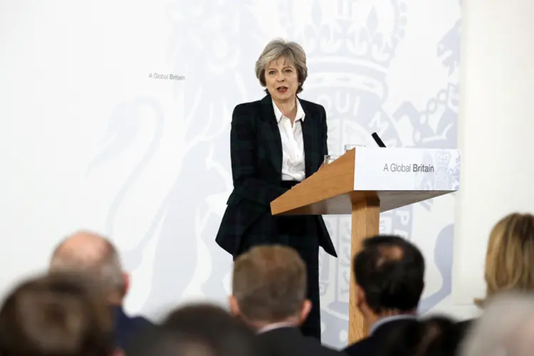 Theresa May, sobre o Brexit:a líder conservadora insistiu que tentará chegar a "um acordo ambicioso de livre comércio" com o bloco (Kirsty Wigglesworth)