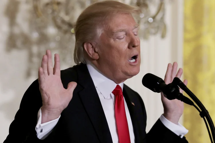 Trump: O primeiro decreto foi assinado por Trump no dia 27 de janeiro, apenas uma semana depois de sua posse (Carlos Barria/Reuters)