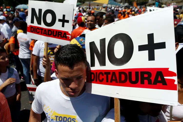 Protesto: deportação significaria condenar essas pessoas "à pena de morte", ressaltou o vice-presidente do Veppex (Carlos Garcia Rawlins/Reuters)