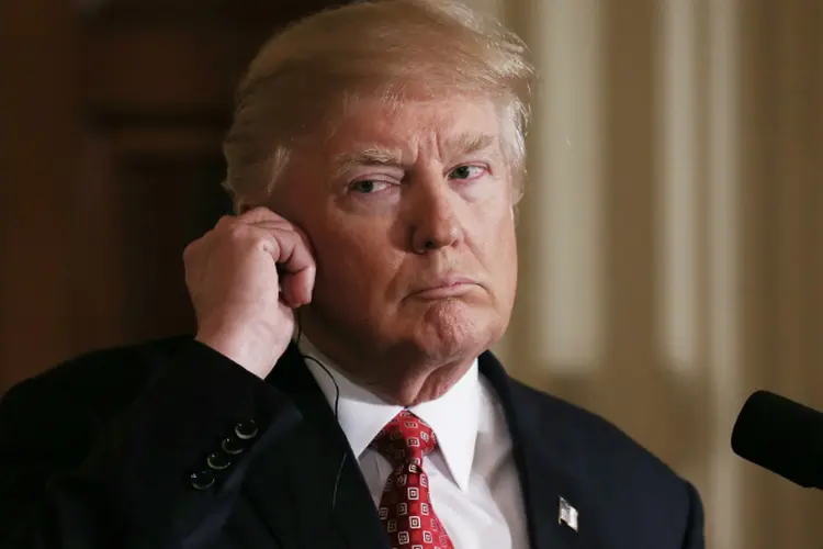 Trump: a Casa Branca se vê envolvida em uma série de questionamentos sobre os contatos entre a equipe de Trump e a Rússia (Mario Tama/Getty Images)