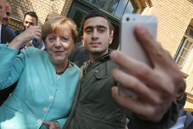 Selfie: a foto de Anas Modamani com a chanceler deu a volta ao mundo (Sean Gallup/Getty Images)