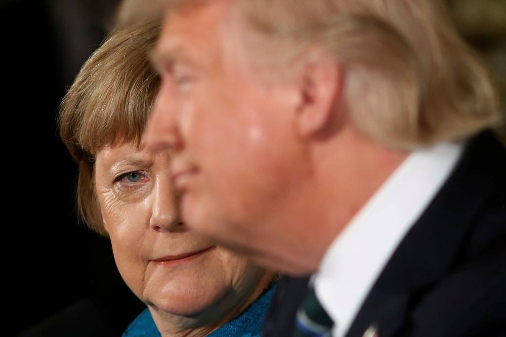 Merkel lamenta decisão de Trump de deixar Acordo de Paris