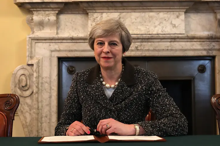 Theresa May: para ela, as duas partes "enfrentam os mesmos desafios globais, o terrorismo e o extremismo" (Christopher Furlong/WPA Pool/Getty Images)