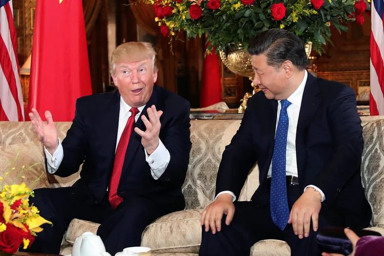 Donald Trump e Xi Jinping: Trump classificou a China como principal rival dos Estados Unidos, principalmente em matéria de comércio internacional (Carlos Barria/Reuters)