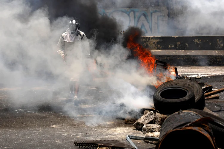 Protesto: o jovem morreu atingido por um tiro durante uma manifestação (Carlos Garcia Rawlins/Reuters)