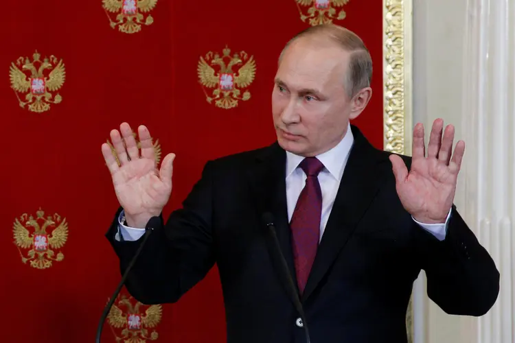 Vladimir Putin: "nós nunca interferimos na vida política e nos processos políticos de outros países" (Sergei Chirikov/Pool/Reuters)