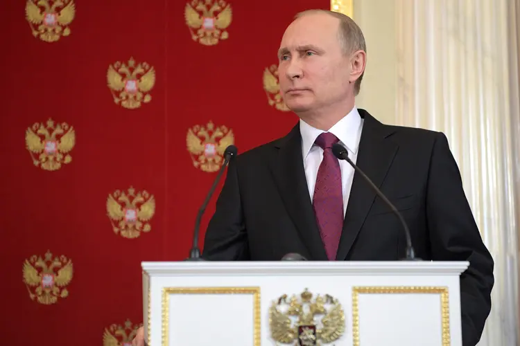 Vladimir Putin: saída à disputa deve ser conseguida por meio da "união de todos os sírios" (Sputnik/Alexei Druzhinin/Kremlin/Reuters)