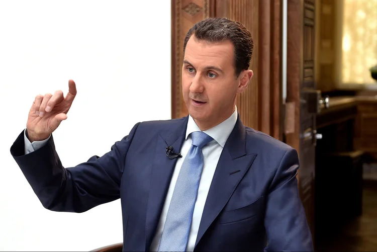 Bashar al-Assad falou a um grupo de políticos da Rússia em visita (SANA/Handout/Reuters)