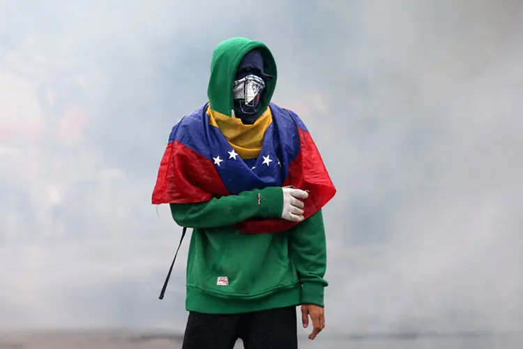 Venezuela: Santos pediu "sanidade" às autoridades venezuelanas e se uniu a outros países, como Brasil, Argentina e México (Carlos Garcia Rawlins/Reuters)