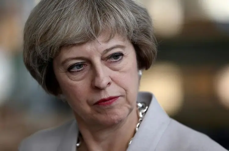 Theresa May: a premiê perdeu forças após as eleições gerais da semana passada (Neil Hall/Reuters)