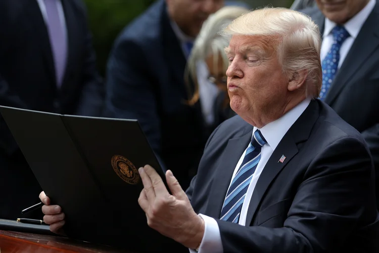 Donald Trump: "o Departamento de Justiça deveria ter mantido a restrição de viagens original, não a versão atenuada e politicamente correta que submeteu à Suprema Corte" (Carlos Barria/Reuters)