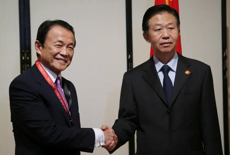 Ministros do Japão e China: eles não discutiram questões como moedas e riscos geopolíticos do programa nuclear e de mísseis da Coreia do Norte durante o diálogo (Koji Sasahara/Reuters)