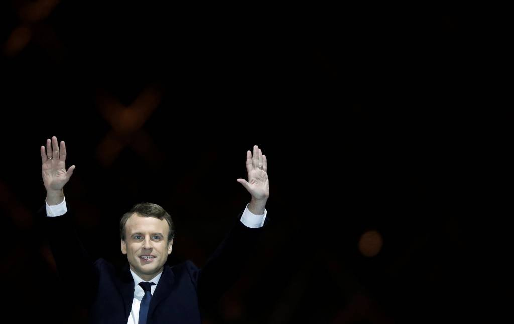 Macron: o hino nacional francês foi entoado, mas ao final do discurso de Macron (Christian Hartmann/Reuters)