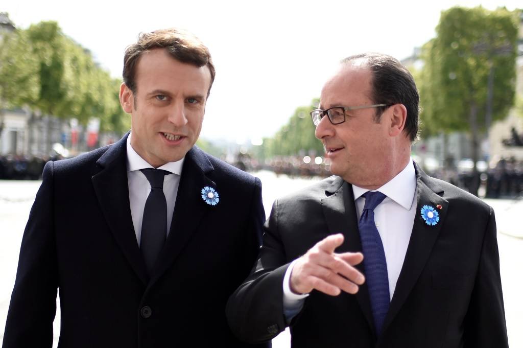 Macron e Hollande: Macron, que será o presidente mais jovem da República francesa aos 39 anos, atingiu seus melhores resultados em Paris (Stephane De Sakutin/Reuters)