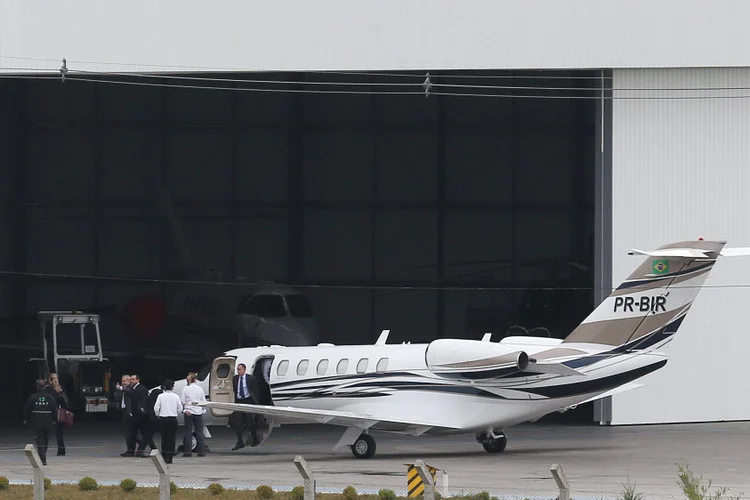 Curitiba: os desembarques de Lula e da ex-presidente Dilma motivaram a montagem de um esquema especial de segurança (Paulo Whitaker/Reuters)