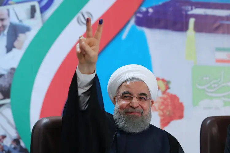 O presidente reeleito Hassan Rouhani venceu com mais de 57 por cento dos votos (President.ir/Reuters)