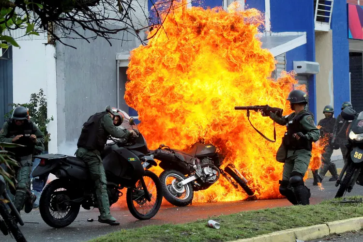 Protesto: até o momento, 59 pessoas morreram nas manifestações e mais de mil ficaram feridos (Carlos Eduardo Ramirez/Reuters)