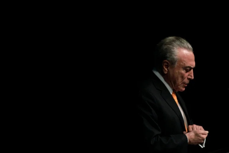 Michel Temer: líderes e dirigentes esperam a divulgação do áudio da gravação em que Temer apareceria apoiando a compra de silêncio de delatores da Lava Jato para decidir se rompem ou não com o governo (Ueslei Marcelino/Reuters/Reuters)