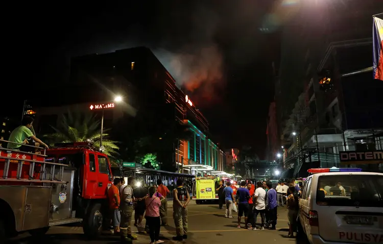 Ataque em Manila: um funcionário disse que um grupo de homens armados e mascarados havia entrado nas dependências (Erik De Castro/Reuters)