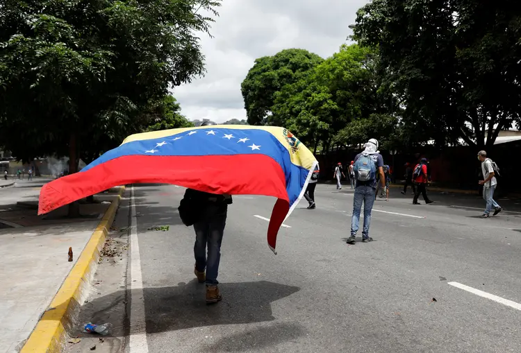 Protestos: a pressão de rua contra o governo venezuelano começou há 66 dias (Carlos Garcia Rawlins/Reuters)