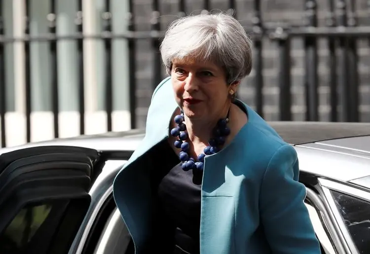 Theresa May: ela tem realizado conversas com o DUP sobre assegurar apoio de seus 10 membros do Parlamento para aprovar leis (Peter Nicholls/Reuters)