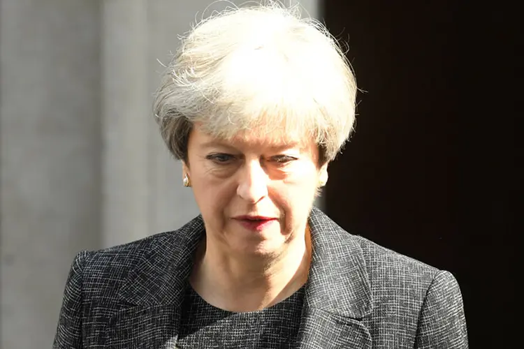 Theresa May foi criticada dentro de seu próprio Partido Conservador devido à sua reação sobre o incêndio (Toby Melville/Reuters)