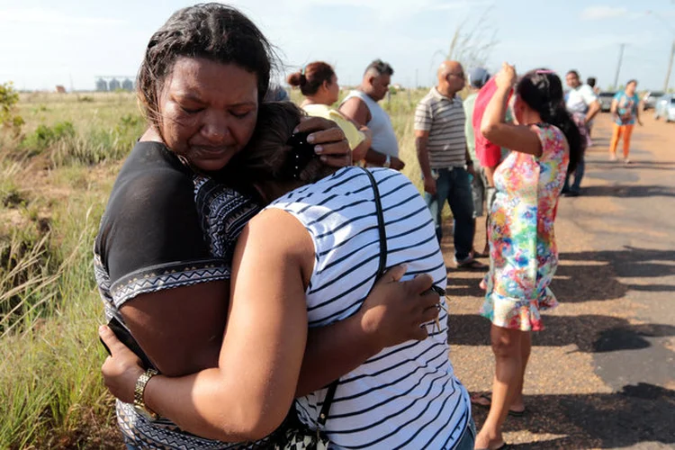 PARENTES DAS VÍTIMAS EM RORAIMA: governo está tratando o caso como acerto de contas interno  / JPavani/ Reuters