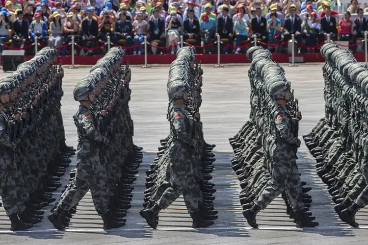 Exército chinês: Pequim se opõe "firmemente" a alguns aspectos deste relatório (Kevin Frayer/Getty Images)