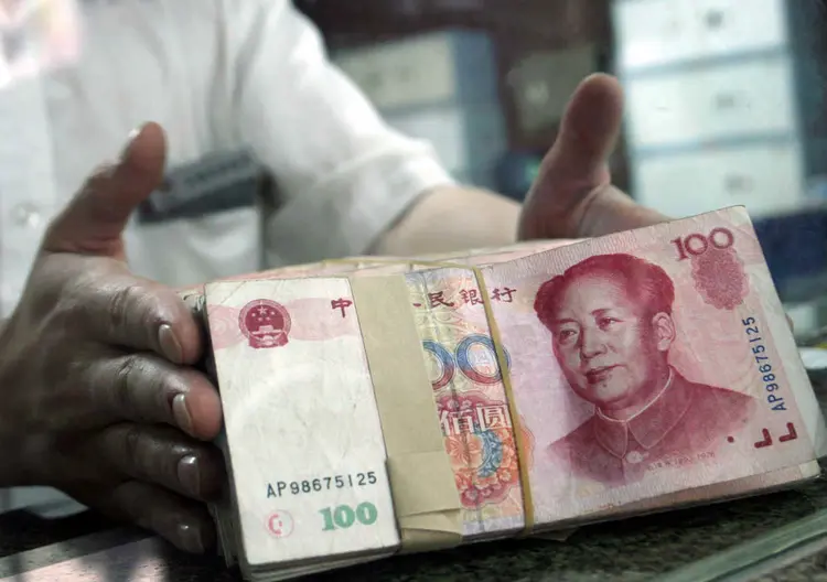 CHINA: o passo mais importante que o país pode tomar para promover a internacionalização do renminbi consiste em fortalecer os mercados financeiros nacionais / China Fotos