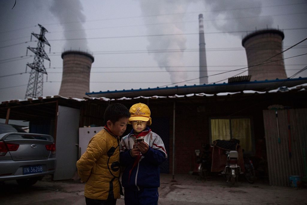 TRABALHADORES CHINESES: esta nova China  de salários mais altos representa um fator a mais para o crescimento de nossas exportações de produtos industriais / Kevin Frayer/Getty Images