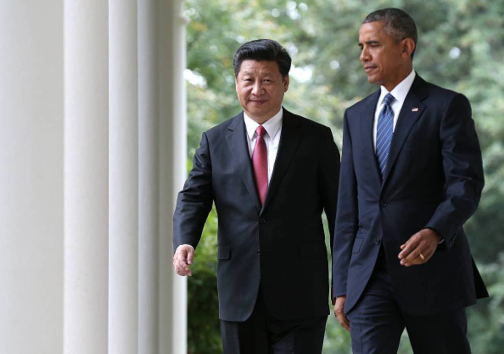 XI JINPING E BARACK OBAMA: China, Estados Unidos e alguns países da Europa estão fechando cada vez mais suas economias / Win McNamee / Getty Images