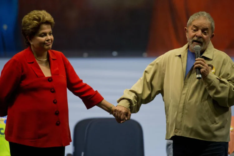 DILMA E LULA: ajuste será obviamente dolorido e terá que ser compartilhado por uma população sistematicamente desinformada por trapaceiros / Nelson Almeida / Getty Images (Nelson Almeida / Getty Images)