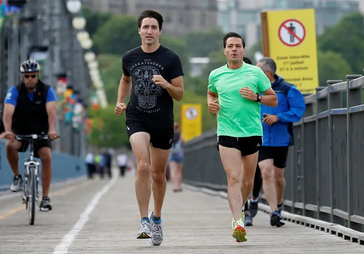 JUSTIN TRUDEAU E ENRIQUE PEÑA NIETO: presidentes do Canadá e do México se exercitam antes do encontro em Ottawa / Chris Wattie / Reuters