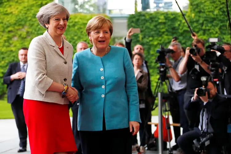 May e Merkel: o encontro acontece antes do encontro com os demais líderes europeus que participarão da reunião, na semana que vem, do G-20 (Fabrizio Bensch/Reuters)