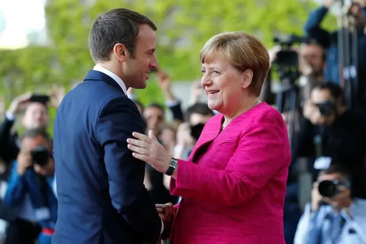 Macron comentou que deseja que a UE permaneça aberta no comércio internacional, mas que modernize seus instrumentos de defesa (Fabrizio Bensch/Reuters)