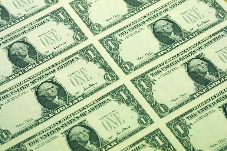 Dólar: a moeda avançou 0,19 por cento, a 3,2618 reais na venda, depois de oscilar entre a mínima de 3,2424 reais e a máxima de 3,2627 reais (Alex Wong/Getty Images)