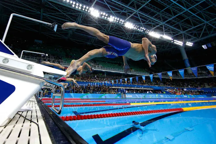 PHELPS EM AÇÃO: o maior medalhista olímpico é estrela da marca americana Under Armour / Adam Pretty/ Getty Images