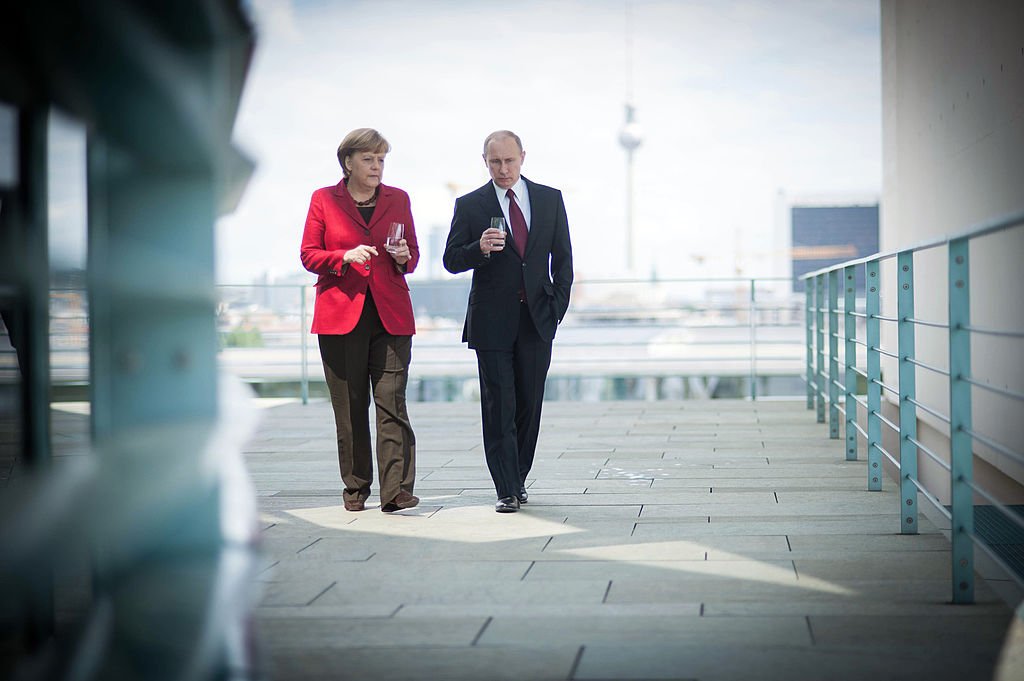 Putin e Merkel: novos territórios