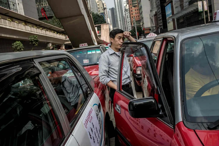 China: a tecnologia de reconhecimento facial identifica o indivíduo graças a uma base de dados e mostra uma foto da infração (Chris McGrath/Getty Images)