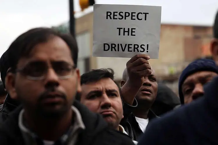 NOVA YORK: motoristas do Uber protestam contra as tarifas pagas pela companhia  / Spencer Platt/Getty Images