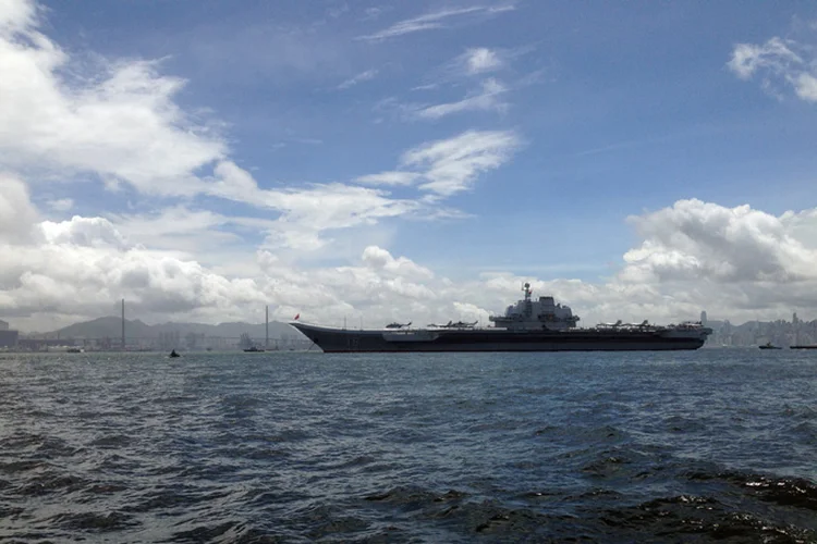 Liaoning faz parte de flotilha em treinamento (Greg Torode/Reuters)