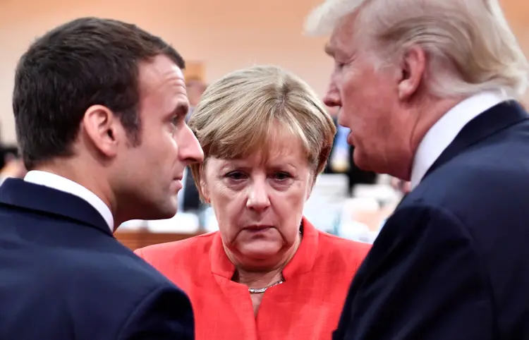 G20: assim como resolver as diferenças sobre comércio e o clima, Merkel deve liderar as discussões sobre migração (John MacDougall/Reuters)