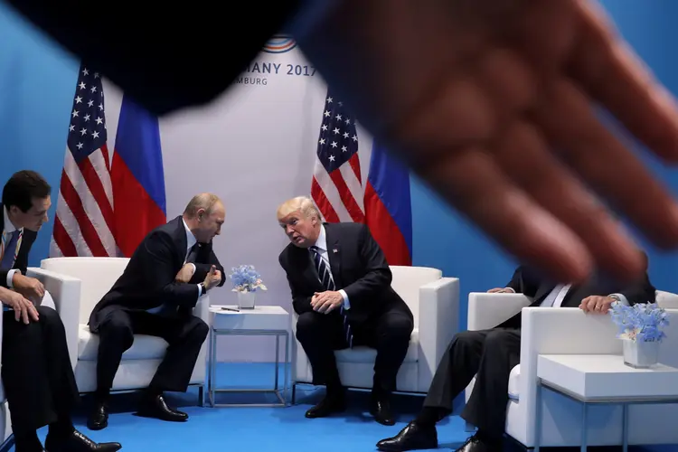 Putin e Trump: a tensão entre os dois países aumentou este ano após o caso Skripal e a Guerra na Síria (Carlos Barria/Reuters)