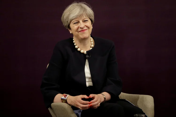 Theresa May: a premiê disse que o emprego está no "centro" do sucesso do Reino Unido como país (Matt Dunham/Pool/Reuters)