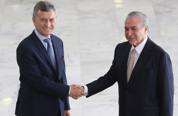 MACRI E TEMER: a transição via eleição na Argentina dá a impressão de que nossos hermanos do Sul estariam mais bem colocados que nós / Adriano Machado/Reuters
