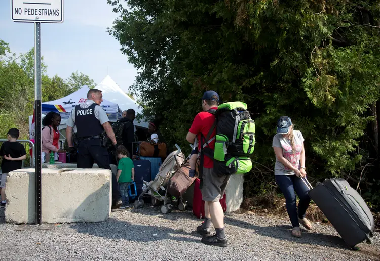 Refugiados na fronteira: de janeiro a junho o Québec recebeu 6.505 solicitantes de refúgio (Christinne Muschi/Reuters)