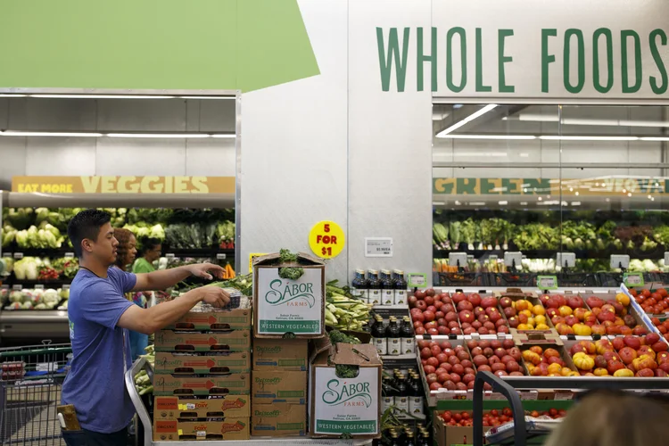 Amazon e Whole Foods (Patrick T. Fallon/Bloomberg)