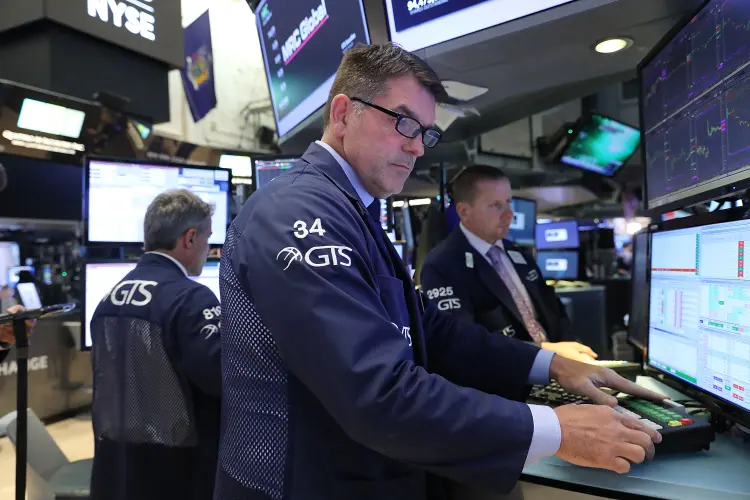 Dow Jones: as ações da Apple subiram 4,73% um dia após surpreender os mercados com seus resultados (Spencer Platt/Getty Images)