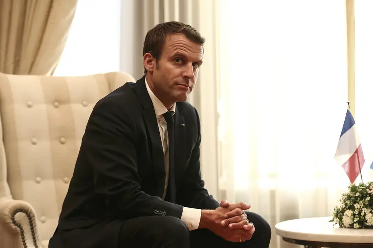 Emmanuel Macron: o presidente subiu nas pesquisas em setembro, mas não tanto entre as categorias populares (Yorgos Karahalis/Reuters)